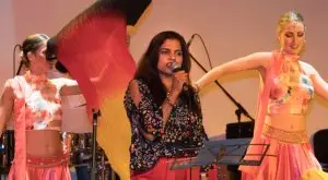 Image of Desi Nach performing alongside bollywood signer.