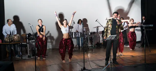 Image of desi nach performing at local event.