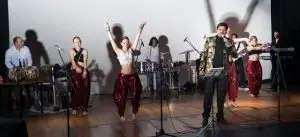 Image of desi nach performing at local event.